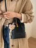 Bolso Cubo Retro de Moda para Mujer 2026 Nuevo Estilo Coreano Bolso de Mano Sencillo Bolso de Hombro con un Toque de Lujo Bolso Cruzado Versátil