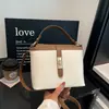 Bolsa de ombro estilo retrô para mulheres, a mais recente coleção da moda outono/inverno, bolsa transversal versátil, bolsa sacola balde fashion