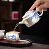 Juego de té de plata dorada, una tetera y dos tazas, juego de té kung fu de viaje portátil de servicio rápido, caja de regalo, adecuado para regalar a personas mayores durante el Festival del Medio Otoño y el Día Nacional