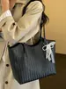 Bolsa tejida de gran capacidad, nuevo modelo 2026, bolso de hombro, elegante y único, adecuado para estudiantes universitarios para la clase y el transporte