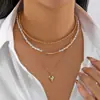 Collares Europeos y Americanos para Mujer, Gama Alta, Estilo Cool, Collar con Colgante de Perla en Forma de Corazón, Collar con Cadena de Aleación Personalizada y Borla