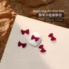 Accesorios Populares para Uñas con Forma de Moño Resina Borgoña Cinta Flujo Mini Pajarita Estéreo Accesorios para Uñas Venta al por Mayor
