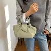 Bolso de cubo de mano de nicho estilo coreano para mujer, nuevo modelo 2026, bolso tote de alta gama para el día a día, elegante bolso de hombro y cruzado