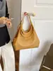 Bolso de hombro tejido para commuter transfronterizo, bolso de mano de diseño simple de nicho, bolso cruzado casual versátil para el uso diario