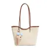 Bolso tote de asa larga para el día a día, moderno y elegante, gran capacidad, diseño simple para uso diario, bolso de hombro con un dije, bolso de mujer de moda