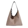 Bolsa de gran capacidad para el día a día para mujer, nuevo modelo de verano 2026, bolso de hombro vintage de nicho de alta gama, bolso tote versátil