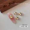 Decoraciones K9 para arte de uñas con pedrería en forma de huevo de paloma color champán, con un estilo de lujo ligero, forma cuadrada regordeta y diseño de bola de pedrería sin base para accesorios de uñas