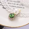 Versión coreana de horquilla verde clip de strass perla de lujo ligero clip lateral rojo en línea para mujer clip de pico de pato tocado al por mayor