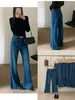 Otoño TOP Fabricado en Europa Guangzhou Trece Hong Bolso coreano versátil de una sola tira Jeans acampanados elásticos de 360 grados con cinturón 82597