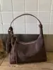 Bolsa de Mão Estilo Coreano Nicho Retrô para Dumpling Feminina Outono/Inverno 2026 Nova Veludo Versátil Casual Ombro Transversal