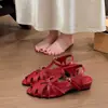 Sandalias Romanas Estilo Retro 2026 Verano Nuevas Nicho Punta Cerrada Sin Espalda Tejidas Huecas Tira en T Sandalias de Tacón Bajo