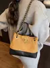 Bolso tote de cadena con patrón de rombos estilo Chanel pequeño para mujer 2026 nuevo bolso de mano de alta gama bolso de hombro único cruzado