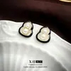Pendientes de plata con luz de aguja, de lujo, de circonita negra de alta gama, con un toque de amor, pendientes geométricos de temperamento nicho, con un diseño único y sentido del humor.