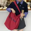 Bolsa de Lona Feminina Grande Capacidade 2025 Nova Verão Casual Simples Ombro Sacola de Compras Bolsa Tote para Aula e Trabalho