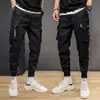 Pantalones de hombre estilo coreano de moda que combinan con todo Otoño Nuevo Nacional de moda pantalones deportivos recortados sueltos con tobillos atados monos de moda para hombres