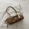 Coleção nova de 2026: bolsa de ombro com laço em nicho para mulheres, bolsa de ombro de bolinhas moderna e versátil para outono e inverno, adequada para trabalho e deslocamento