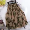 Saia Midi de Malha com Bordado de Folhas Florais Outono e Inverno Feminina 20265 Novo Estilo Coreano Fashionável com Caimento Amplo e Barra Grande