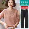 El popular suéter de punto con cordones diagonales y escote calado de este año es un nuevo estilo de otoño e invierno para madres, con un diseño simple y elegante de manga larga.