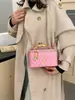 Bolso de mano de moda con nuevo patrón de diamantes para comercio exterior, bolso de hombro con cadena para mujer, bolso cruzado pequeño de alta gama estilo Chanel para cosméticos