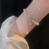 Pulseira Pérola da Bênção para Mulheres com Pingente de Pérola Sino da Bênção, Pulseira de Luxo Leve, Joia com Design Vintage Ins de Nicho