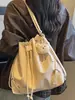 Shuai Mi Home Bolso Cubo de Moda Coreana con Cordón Simple 2026 Nuevo Nicho de Moda de Alto Valor Bolso de Hombro