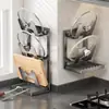 El fabricante suminista un estante de cocina multifuncional sin taladro para tapas de ollas, un soporte vertical para tabla de cortar para uso doméstico