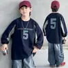Ropa nueva de otoño para niños: sudadera raglán con estampado de letras y cuello redondo para niños mayores, camiseta básica holgada para primavera y otoño 2026