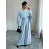 Moda europea y americana transfronteriza para mujer 2025 primavera y otoño elegante ajustado a la cintura color liso manga larga cuello redondo pierna ancha mono