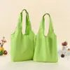 Suministro directo transfronterizo de bolsas de lona de colores lisas listas para usar, bolsas de lona tipo tote multicolor, bolsos de hombro de gran capacidad para el trabajo