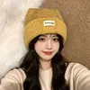 Gorro de punto para mujer de otoño e invierno, lindo y cálido, versátil, estilo coreano, adelgazante y protector de orejas