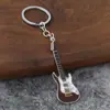 Novo chaveiro pingente de guitarra transfronteiriço, pingente criativo de instrumento musical, liga de zinco DIY decoração para mochila de estudante