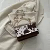 Bolso Retro Europeo y Americano con Estampado de Vaca para Mujer 2026 Verano Nuevo Estilo Bolso de Hombro Cruzado Texturizado para Viajes