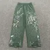 Hecho a medida desde la fábrica de origen, pants de sudor rasgados estilo americano, pants de sudor holgados de pierna ancha pintados a mano, pants de sudor para hombre de moda urbana