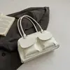 Bolso de Axila de Nicho para Mujer 2026 Modelo Nuevo Gran Capacidad Retro Simple Bolso de Mano para Viajes Bolso de Hombro Versátil a la Moda