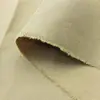 Suministro en stock de tela de piel de durazno lisa cepillada 75D*150D para almohadas, delantales, cajas de almacenamiento y bolsas de ropa