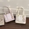 Bolsa de Mão Estampada de Urso Tendência Bolsa Saco para Mulheres 2026 Nova Moda de Nicho Bolsa de Ombro Transversal Versátil de Alta Qualidade
