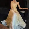 Vestido largo elegante negro Lanxi con encaje de lentejuelas, diseño de torsión en la cintura y parche de malla con abertura