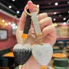 Chaveiro Criativo da Moda com Fivela Redonda e Coração de Strass, Lindo Pingente de Coração de Argila com Strass para Bolsas de Meninas, Alto Valor Estético