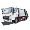 Caminhão Compactador de Lixo Sinotruk Howo de 6 Metros Cúbicos Coleta e Transporta Lixo Doméstico na Comunidade com uma Rede Completa de Pontos de Venda de Pós-Venda