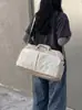 Diseño de tendencia transfronterizo sentido de diseño bolsa de viaje para mujer gran capacidad bloques de color empalmados bolsa de fitness bolsa de equipaje de mano para viaje de negocios de corta distancia