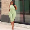 12136 Ropa de comercio exterior transfronteriza europea y americana para mujer, nuevo mono sexy con estampado texturizado, tirantes en la espalda, cuello halter, con pantalones hasta la rodilla