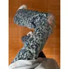 Jeans rotos con estampado de estrellas estilo high street americano para hombre, marca de tendencia de verano de ajuste limpio, pantalones rectos de pierna curva microacampanados