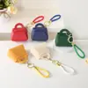 Bolsa para monedas pequeña de color caramelo linda estilo coreano, monedero, llavero para llaves, bolsa pequeña creativa de macarrón para llevar en la mano