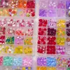 Paquete de 24 compartimentos de populares accesorios transfronterizos para decoración de uñas, piezas pequeñas de resina, pinzas para el cabello, pendientes, accesorios para uñas postizas, diamantes de imitación de fondo redondo al por mayor