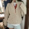 Estilo coreano de alta qualidade de Dongdaemun, design de cores contrastantes, suéter de malha pulôver nicho com botões ocultos e bainha com cordão