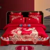 Nuevo conjunto de boda de cuatro piezas 100% algodón bordado 2026, con un diseño lujoso y elegante de algodón de fibra larga, en estilo chino tradicional y color rojo vibrante para bodas