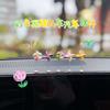 Decoración de coche, pequeño molino de viento, nuevos accesorios curativos para el interior, consola central giratoria creativa para el coche, adornos con cabeza temblorosa