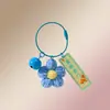 Llavero de flor de pompón de ganchillo, colgante para bolso, accesorio exquisito y práctico para estudiantes, regalo de graduación para profesores