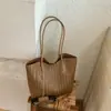 Bolsa de mano casual simple de gran capacidad Shuai Mi Jia, bolso de hombro tejido de moda para el trabajo, bolso de axila personalizado de moda