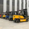 Carretillas Elevadoras Eléctricas 1 Tonelada 2 Toneladas 3 Toneladas 5 Toneladas Cuatro Ruedas Montables Nueva Energía Litio Apilador Carretilla Elevadora Eléctrica Personalización Transfronteriza